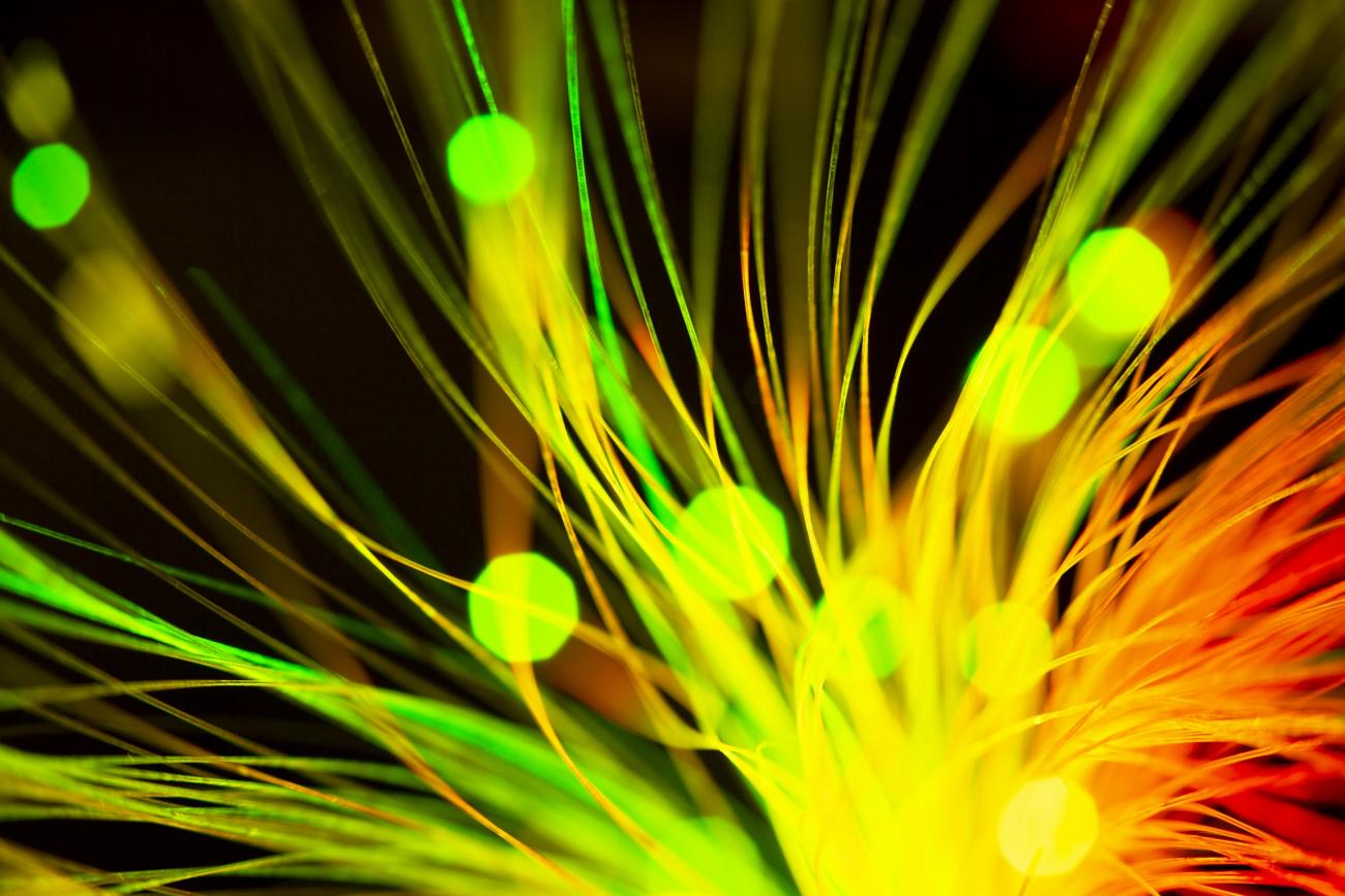 Colorful strings representing optical fibers